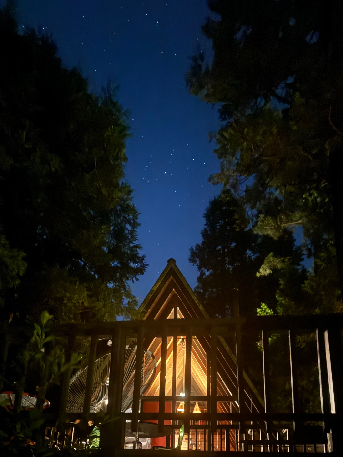 The A-Frame glowing under a starry sky